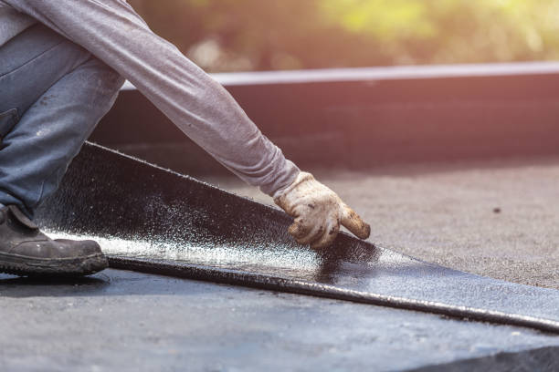 Professional Waterproofing technician working in Hudson, IN